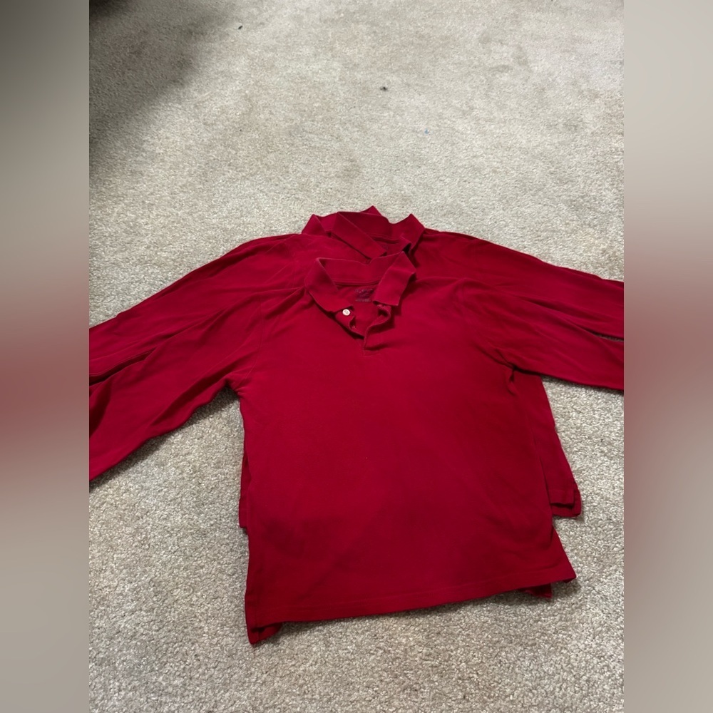3 preowned red school long sleeve uniform shirts. Size 10 big kids